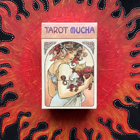 6Witch3 Tarot Mucha deck by Lo Scarabeo - front of the box shown on a handpainted red and black sun background