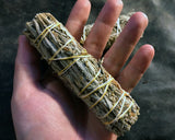 6Witch3 black sage aka mugwort herb bundle in the 5" size shown in the palm of the hand