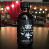 6Witch3 Agua Florida shown in brown glass 2oz bottle
