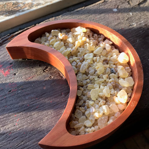 6Witch3 Altar Blend resin incense shown loose in a moon-shaped wooden bowl