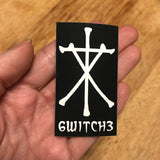 6Witch3 Witch cross sticker, held in hand