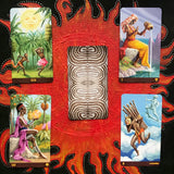 6Witch3 African American Tarot deck by Lo Scarabeo - four drawn cards and one card flipped with the back visible, shown on a handpainted red and black sun background