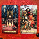 6Witch3 Everyday Witch Tarot deck - the High Priestess and the Devil cards shown on a handpainted red and black sun background