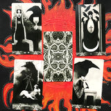 6Witch3 Murder of Crows Tarot deck by Corrado Roi - four drawn cards and one card in the middle flipped to show the back displayed on a handpainted red and black sun background