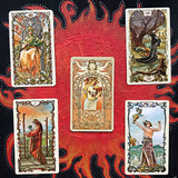 6Witch3 Tarot Mucha deck by Lo Scarabeo - four drawn cards with a fifth card in the center flipped to show the back displayed on a handpainted red and black sun background