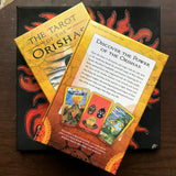 6Witch3 The Tarot of the Orishas tarot deck by Zolrak & Durkon - front and back of the box shown on a handpainted red and black sun background
